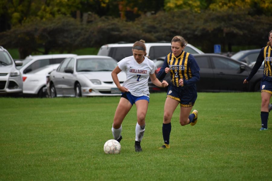 Lauren Ives moves past Rochester player during their regular season game, held at home on Oct. 2. 