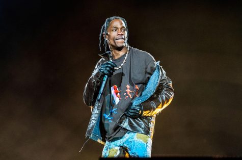 Travis Scott looks out at the audience during his performance.